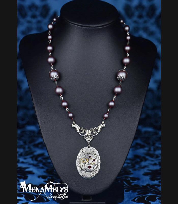 Collier steampunk en perle rouge iridescent.